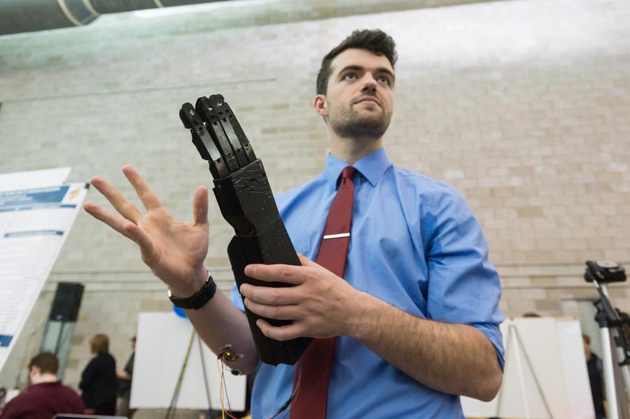 Mechanical engineering student with prosthetic arm at University of Rochester Hajim School of Engineering and Applied Sciences