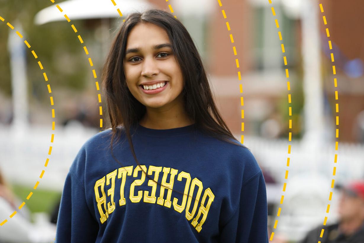 University of Rochester student poses for a photo on campus.